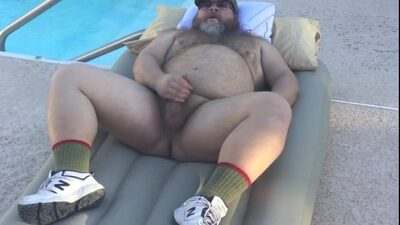 Big Bear jacking off on top of an inflatable air mattress all gay porn video