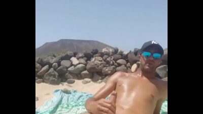 Jerking off at nude beach in Canarias all gay porn video