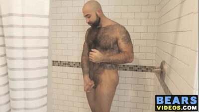 Bear washes his furry body and spanks his thick monkey all gay porn video