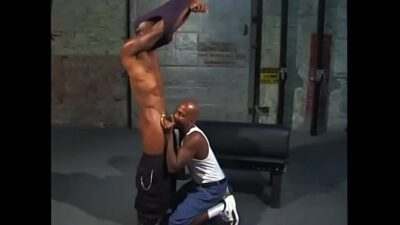 Bald black male in white muscle shirt sucks a dick all gay porn video