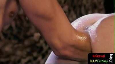 Twink plunges his forearm into asshole all gay porn video