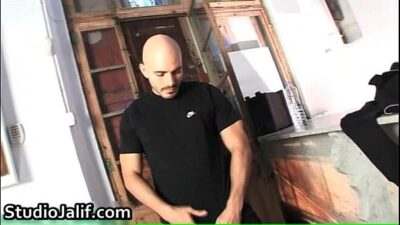 Muscled gay hunk Yenier jerking gay porn all gay porn video