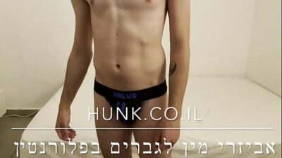 An Israeli man measures products for the HUNK store in Tel Aviv all gay porn video