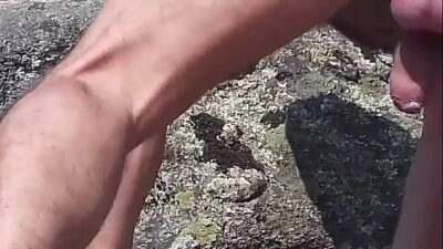 Masturbating on the rocks