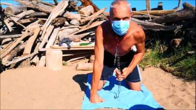 naked slave pig exposed collared, in penis cage, striptease at the gay beach, cucumber fuck, BDSM CBT all gay porn video