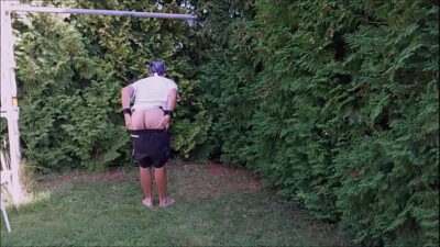 naked pathetic slave exposed in penis cage on outdoor party, striptease with humiliating body writing, BDSM CBT all gay porn video